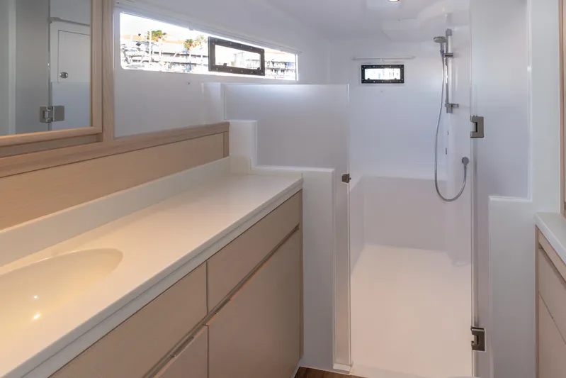 Ohana 8 Yacht Photos Pics Modern bathroom interior in 2020 Balance 526 yacht, featuring sleek design and spacious shower.