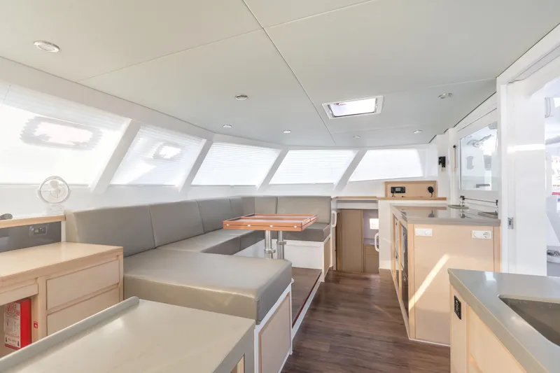 Ohana 8 Yacht Photos Pics Modern interior of 2020 Balance 526 yacht with spacious seating and sleek design.