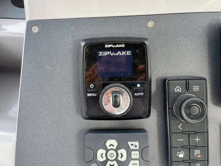  Yacht Photos Pics Control panel of a 2026 Beneteau Swift Trawler 41 featuring Zipwake system.