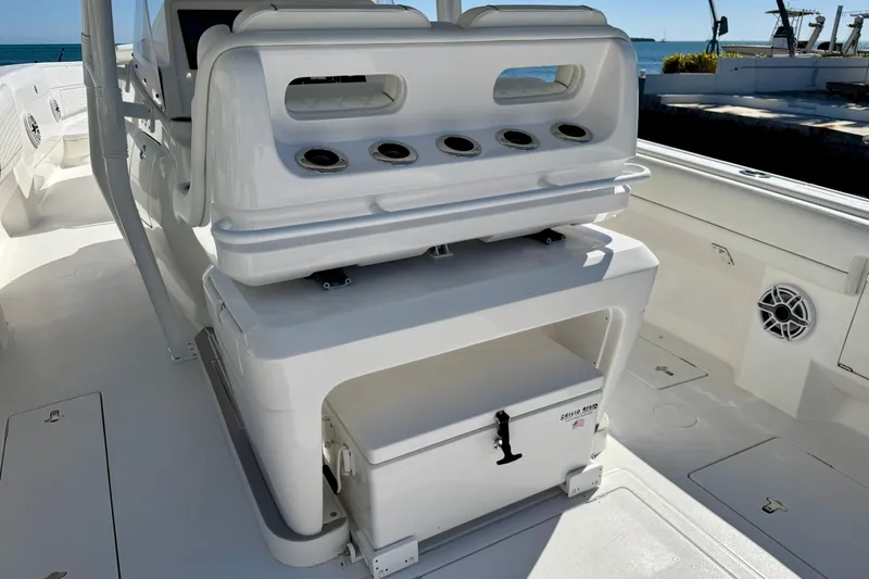  Yacht Photos Pics 2024 Intrepid 407 Nomad FE boat interior with seating and storage compartments.