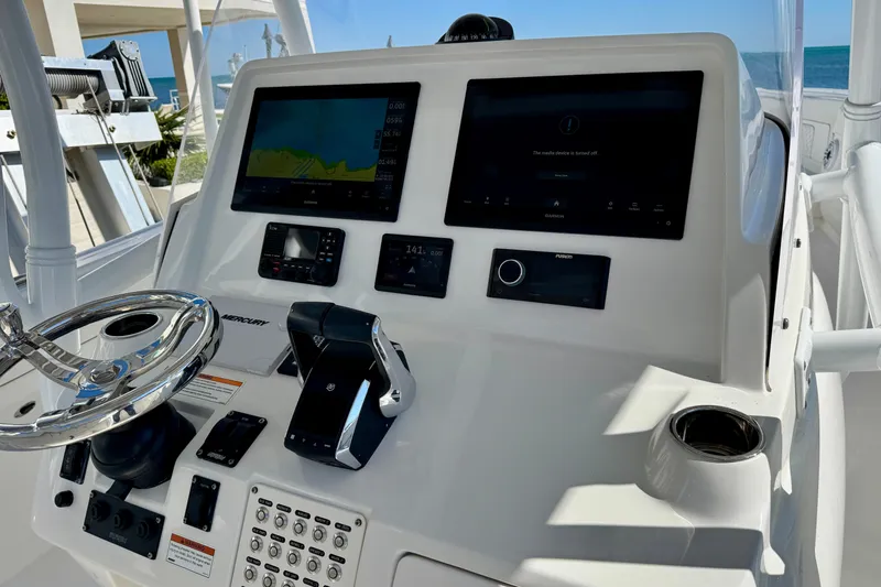  Yacht Photos Pics 2024 Intrepid 407 Nomad FE boat dashboard with advanced navigation and control systems.