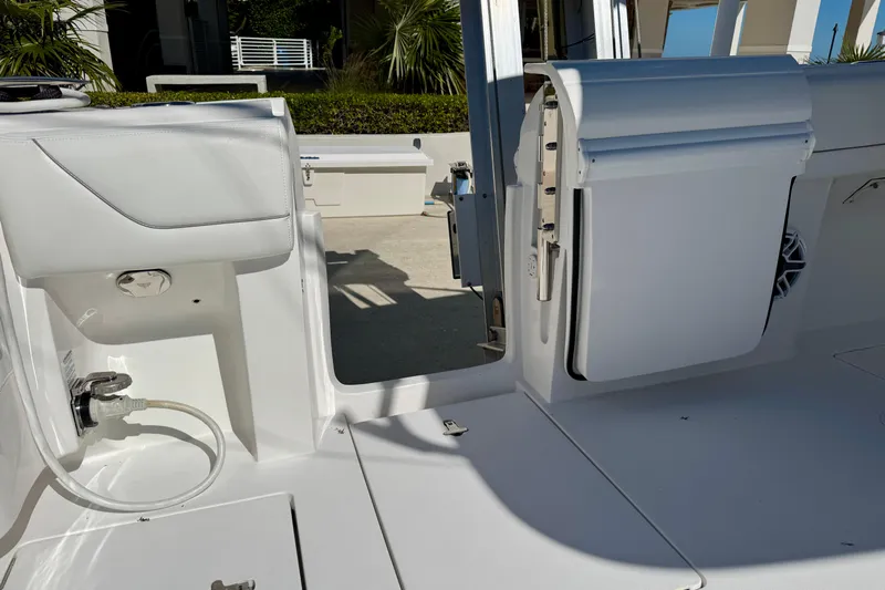  Yacht Photos Pics 2024 Intrepid 407 Nomad FE boat interior with sleek white design and modern features.