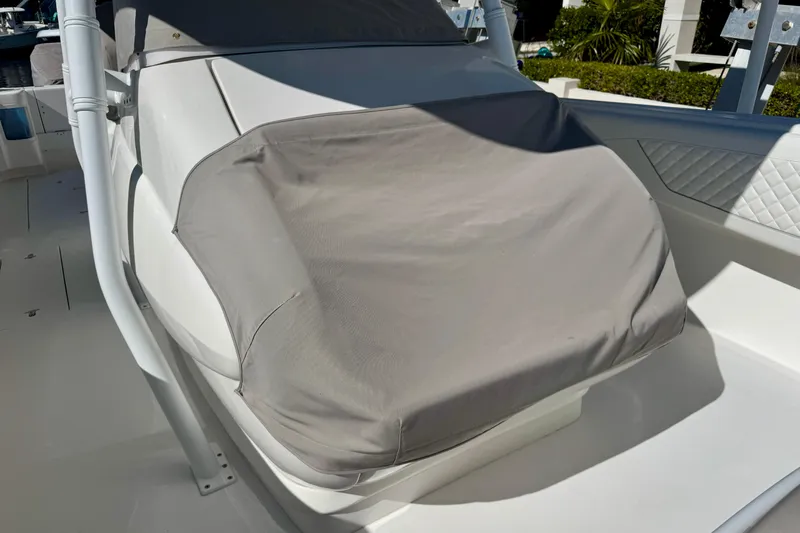  Yacht Photos Pics 2024 Intrepid 407 Nomad FE boat seat with protective cover.