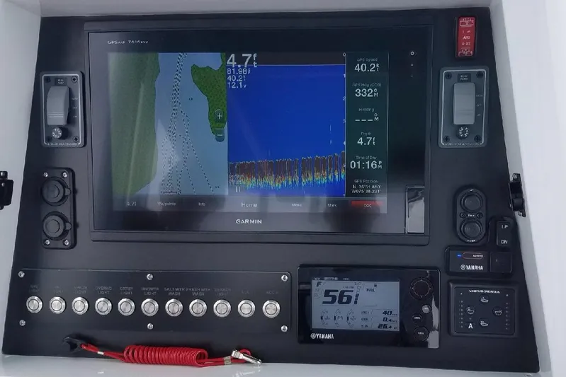 Drift Wood Yacht Photos Pics Control panel of 2017 Custom Carolina 28 CC Harrison Boatworks with navigation and monitoring systems.