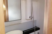 Bathroom interior of 2018 Nautitech 40 Open catamaran with modern sink and shower.