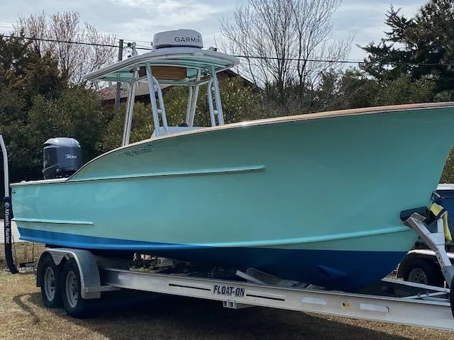 Drift Wood Yacht Photos Pics 2017 Custom Carolina 28 CC Harrison Boatworks on trailer, light blue hull, Garmin equipment.