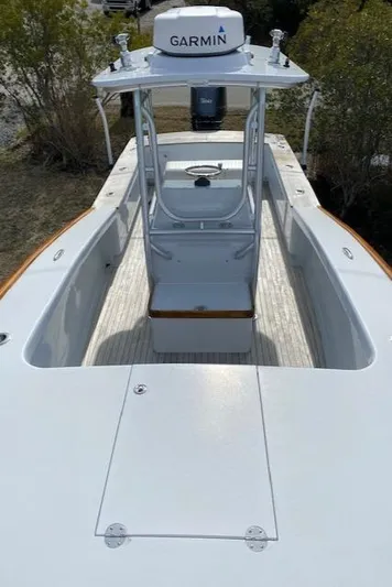 Drift Wood Yacht Photos Pics 2017 Custom Carolina 28 CC Harrison Boatworks with Garmin equipment, sleek design, and spacious deck.