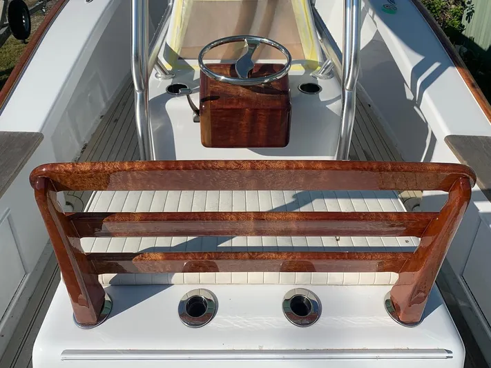 Drift Wood Yacht Photos Pics 2017 Custom Carolina 28 CC Harrison Boatworks with polished wood accents and sleek steering console.