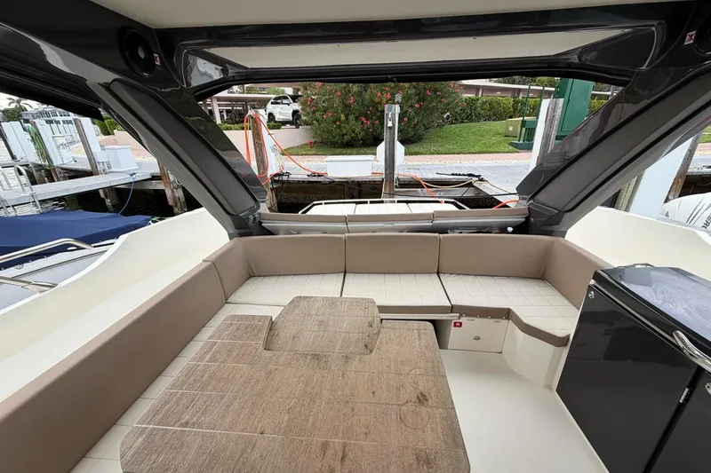  Yacht Photos Pics Luxurious interior of 2019 Absolute 40 SLT yacht with comfortable seating and modern design.