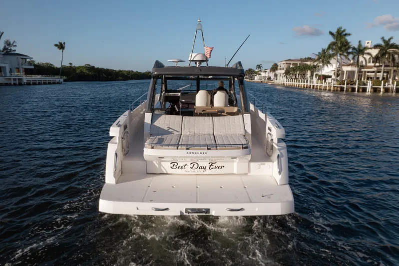  Yacht Photos Pics 2019 Absolute 40 SLT yacht cruising on a scenic waterway with luxury homes.