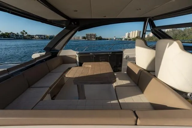  Yacht Photos Pics Luxurious 2019 Absolute 40 SLT yacht interior with spacious seating and scenic waterfront view.