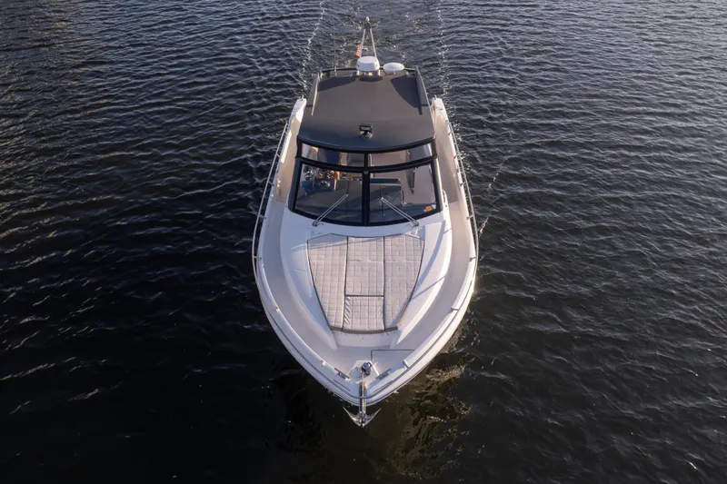  Yacht Photos Pics 2019 Absolute 40 SLT yacht cruising on calm waters, aerial view.