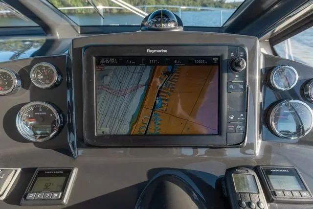  Yacht Photos Pics Cockpit of 2019 Absolute 40 SLT with Raymarine navigation display and gauges.