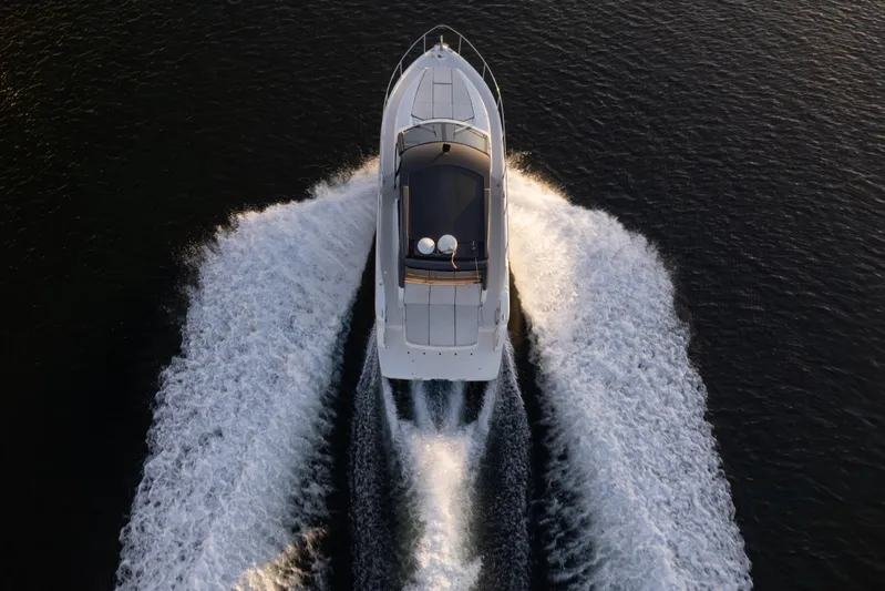  Yacht Photos Pics Aerial view of 2019 Absolute 40 SLT yacht cruising on water.