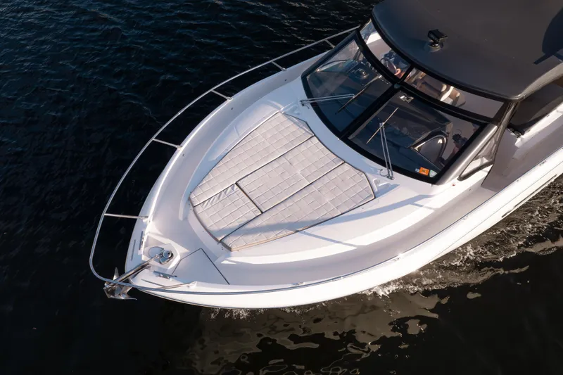  Yacht Photos Pics Aerial view of 2019 Absolute 40 SLT yacht cruising on water.