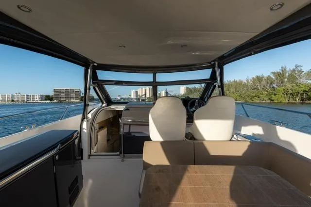  Yacht Photos Pics Interior view of 2019 Absolute 40 SLT yacht cruising on a sunny day.