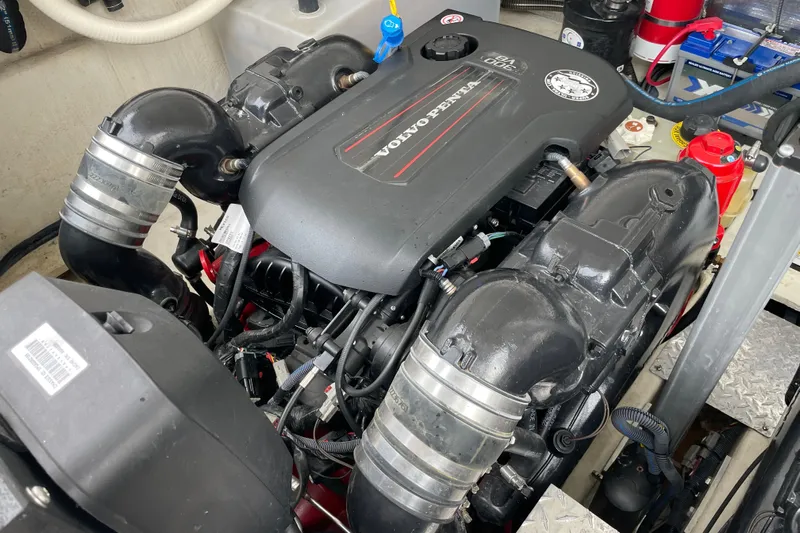 Motivated Yacht Photos Pics Volvo Penta engine in 2017 Regal 35 Sport Coupe boat, detailed view.