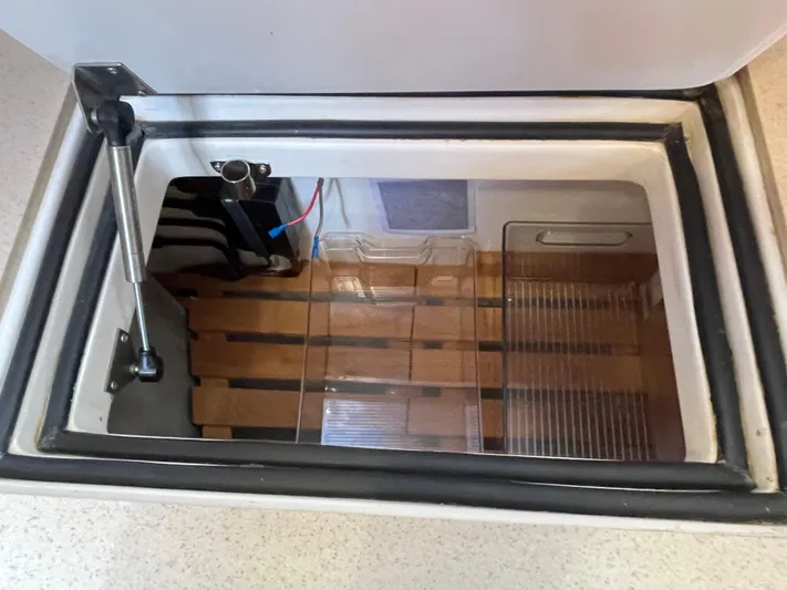 Full Sail Yacht Photos Pics Built-in cooler compartment on a 2003 Tartan 4600 yacht.