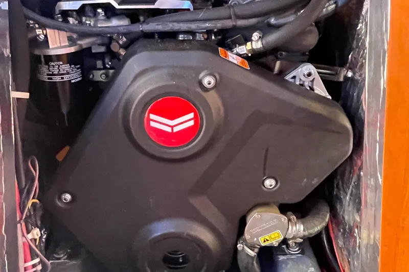 Full Sail Yacht Photos Pics Engine compartment of a 2003 Tartan 4600 sailboat, featuring mechanical components and wiring.