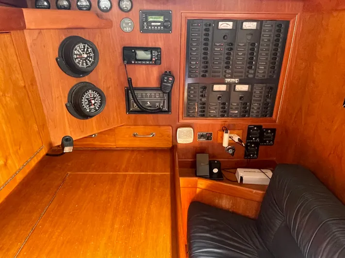 Full Sail Yacht Photos Pics Navigation and control panel of a 2003 Tartan 4600 yacht, featuring instruments and gauges.