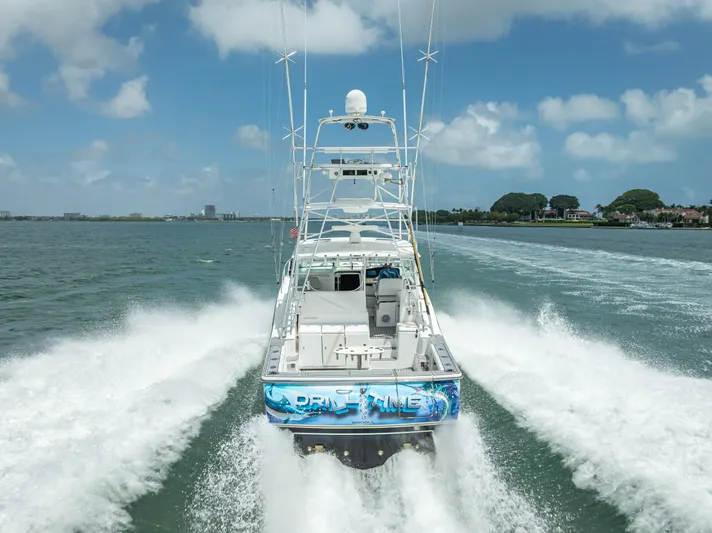 Drill Time Yacht Photos Pics 2006 Tiara Yachts 4200 Open cruising on water, rear view, clear sky.