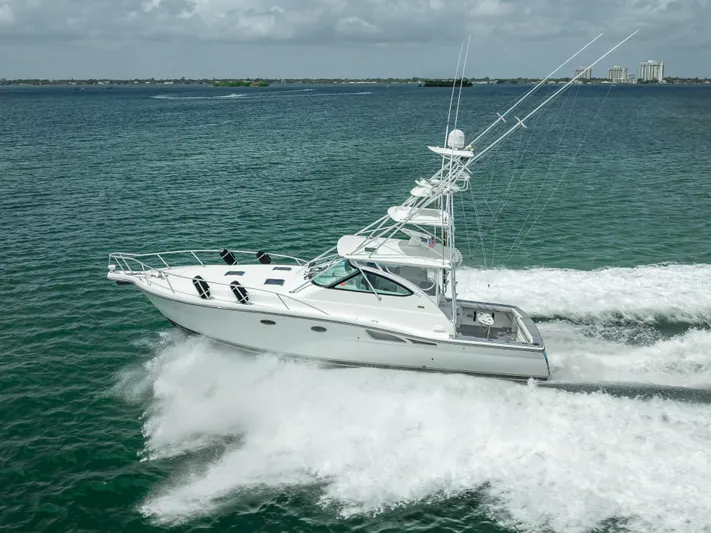 Drill Time Yacht Photos Pics 2006 Tiara Yachts 4200 Open cruising on open water, showcasing sleek design and performance.