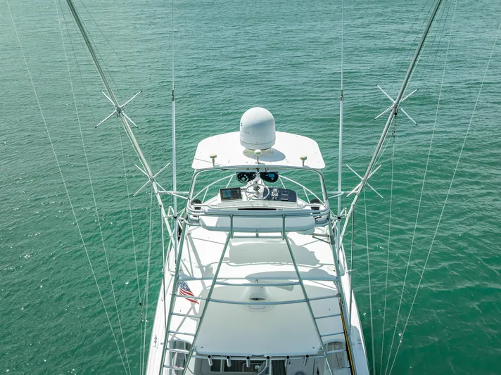 Drill Time Yacht Photos Pics Tiara Yachts 4200 Open 2006 on calm water, aerial view of helm and radar.