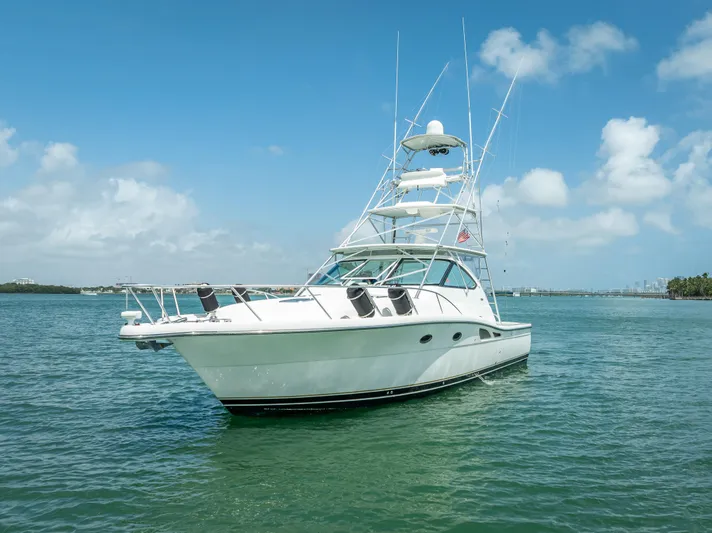 Drill Time Yacht Photos Pics 2006 Tiara Yachts 4200 Open on calm water under blue sky.