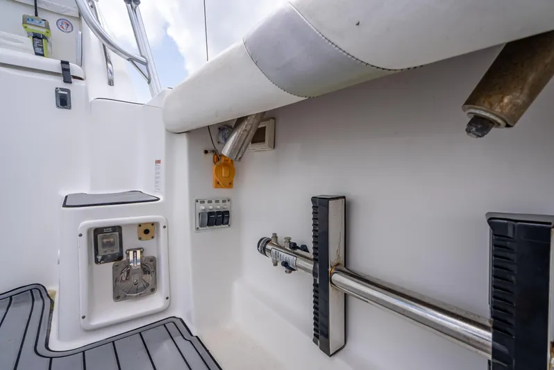 Drill Time Yacht Photos Pics 2006 Tiara Yachts 4200 Open cockpit detail with storage and equipment.