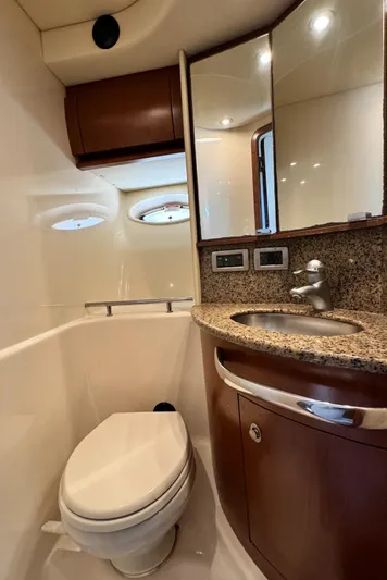  Yacht Photos Pics 2007 Sea Ray 44 Sundancer yacht bathroom with modern fixtures and granite countertop.