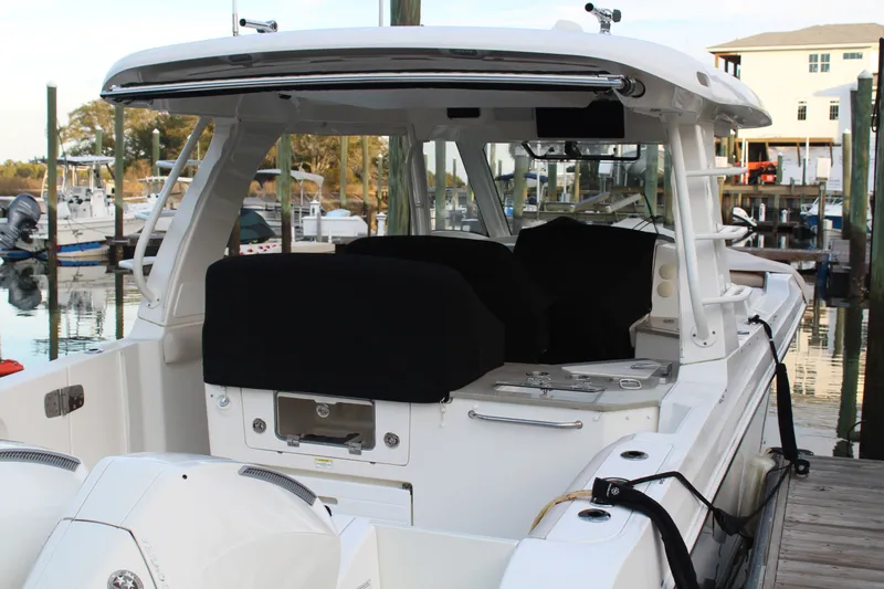 Get Off Me Yacht Photos Pics 2021 Boston Whaler 350 Realm boat docked at marina.