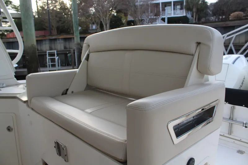 Get Off Me Yacht Photos Pics Beige seating on a 2021 Boston Whaler 350 Realm boat.