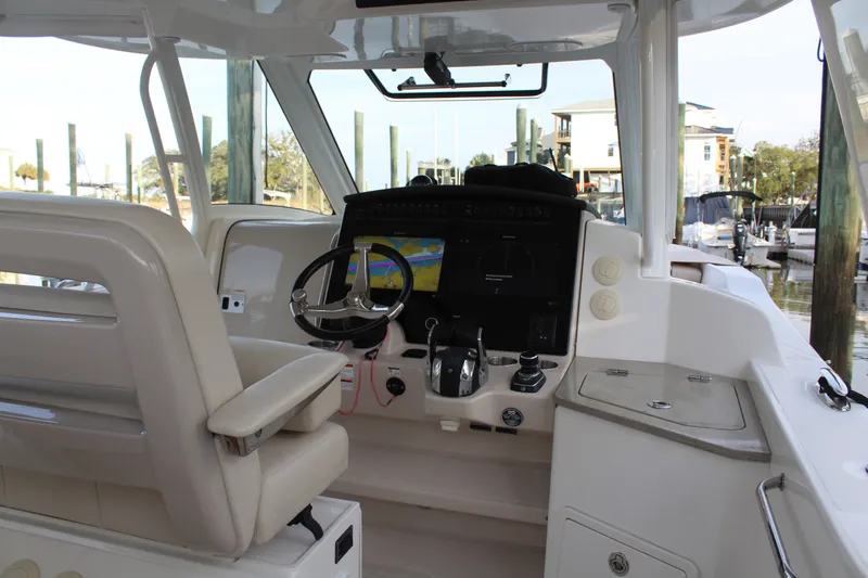Get Off Me Yacht Photos Pics Interior view of 2021 Boston Whaler 350 Realm cockpit.