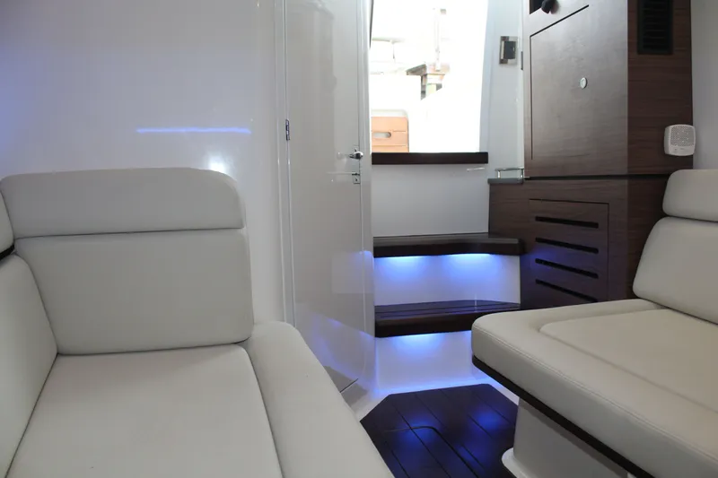 Get Off Me Yacht Photos Pics Interior of 2021 Boston Whaler 350 Realm with sleek seating.