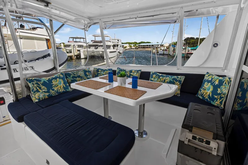  Yacht Photos Pics Luxurious 2016 Leopard 44 Owners Version yacht interior with elegant seating and scenic marina view.