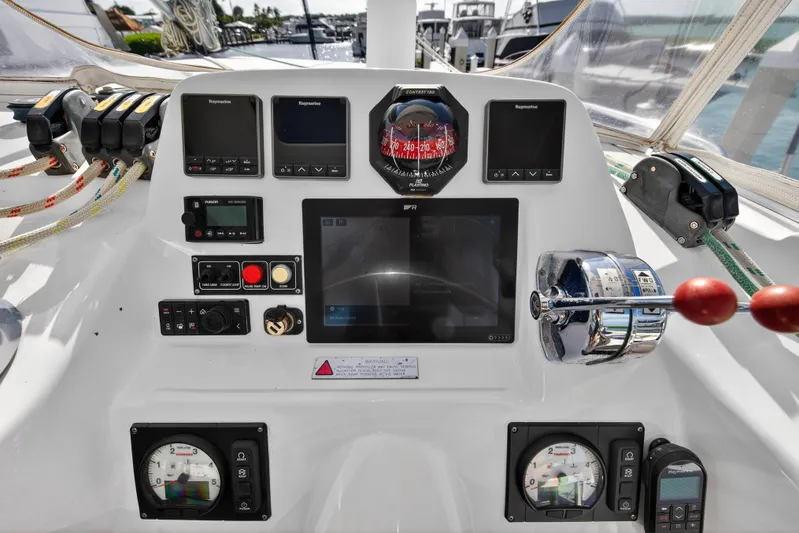  Yacht Photos Pics Control panel of a 2016 Leopard 44 Owners Version catamaran with navigation instruments.