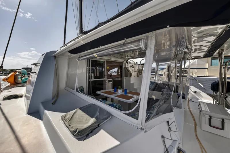  Yacht Photos Pics 2016 Leopard 44 Owners Version catamaran with spacious deck and covered seating area.