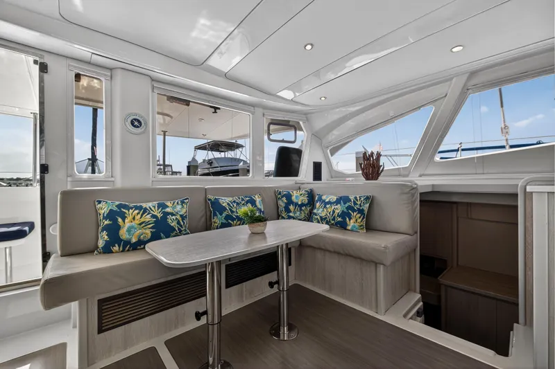  Yacht Photos Pics Luxurious interior of 2016 Leopard 44 Owners Version yacht with elegant seating and decor.