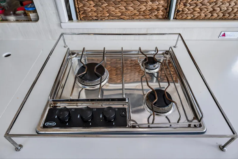  Yacht Photos Pics Stainless steel stove in 2016 Leopard 44 Owners Version yacht kitchen.