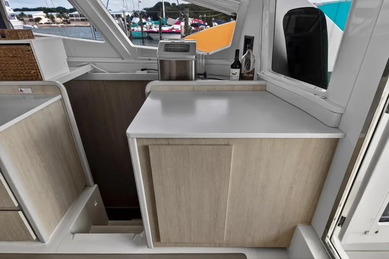  Yacht Photos Pics Interior of 2016 Leopard 44 Owners Version yacht with modern kitchen cabinetry.