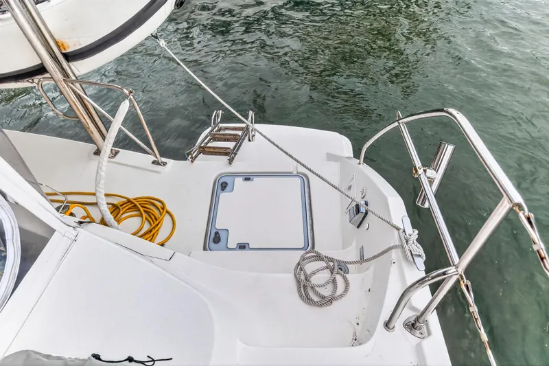  Yacht Photos Pics 2016 Leopard 44 Owners Version yacht stern with ladder and mooring ropes.