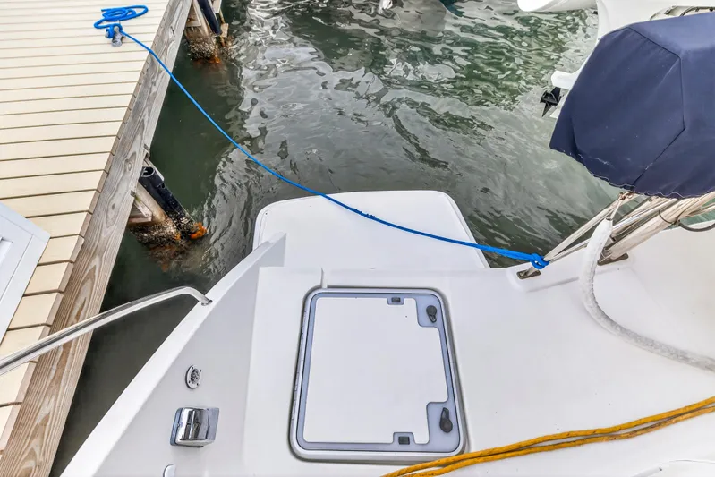  Yacht Photos Pics Leopard 44 Owners Version 2016 yacht docked with blue mooring line.