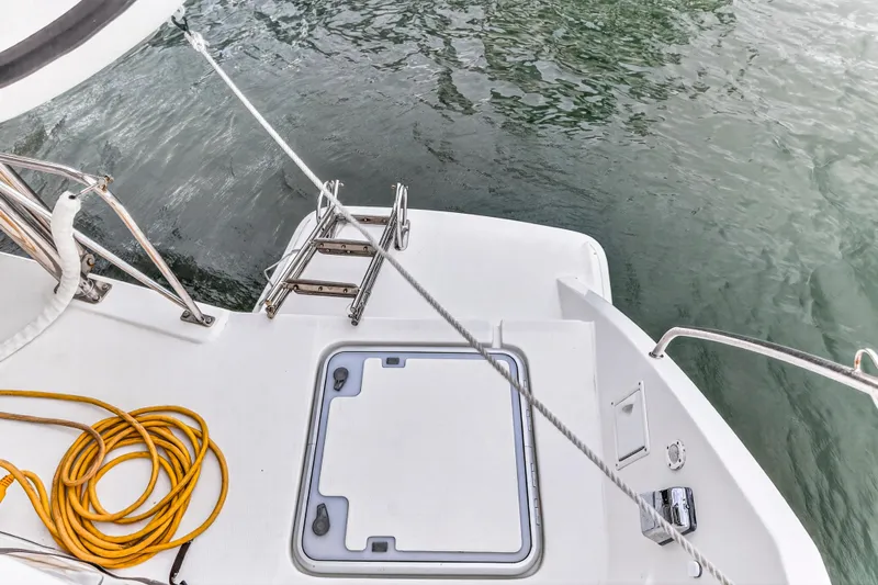  Yacht Photos Pics 2016 Leopard 44 Owners Version yacht stern with ladder and coiled rope.