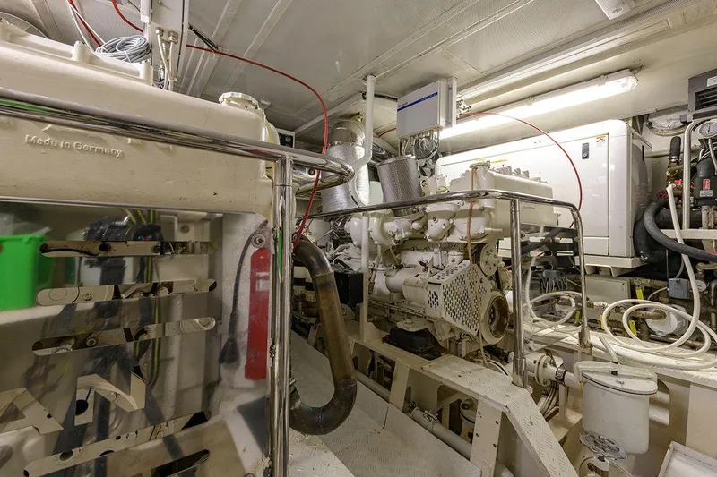  Yacht Photos Pics Engine room of 1965 Feadship CARAVELLE 23 yacht, showcasing machinery and equipment.
