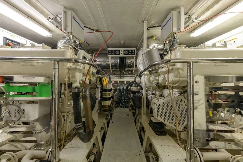  Yacht Photos Pics Engine room of 1965 Feadship CARAVELLE 23 yacht, showcasing machinery and equipment.