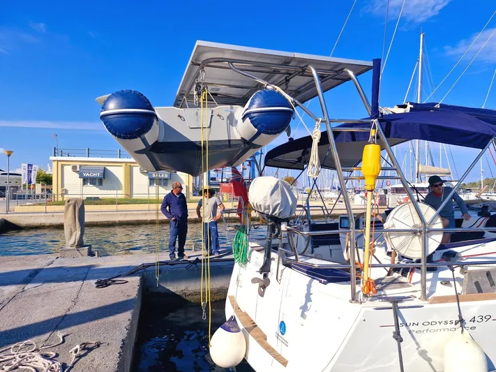  Yacht Photos Pics 2013 Jeanneau Sun Odyssey 439 performance yacht docked at marina with blue sky.