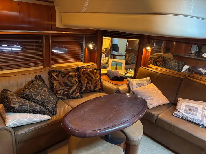 Tradition Yacht Photos Pics Luxurious interior of 2005 Sea Ray 500 Sundancer yacht with plush seating and elegant decor.