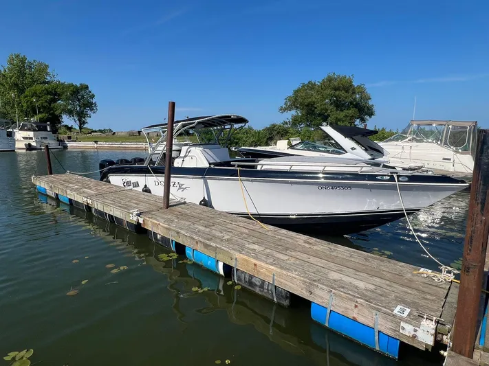  Yacht Photos Pics 2006 Donzi 38 ZFX boat docked on a sunny day.