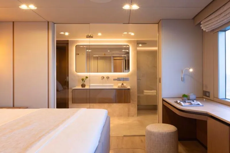 Twilight Yacht Photos Pics Luxurious interior of 2025 Sunreef 100 Power yacht with modern bedroom and bathroom design.