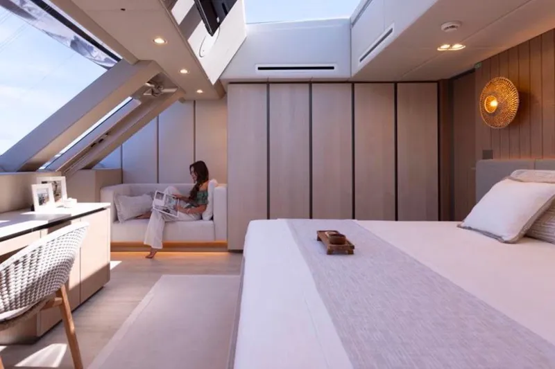 Twilight Yacht Photos Pics Luxurious interior of 2025 Sunreef 100 Power yacht with modern design and natural lighting.
